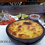 Pastel de Choclo, Quelle:http://www.google.cl/imgres?um=1&hl=es&safe=off&sa=X&biw=1366&bih=667&tbs=isz:l&tbm=isch&tbnid=uC32fIRX-QMyBM:&imgrefurl=http://mezzcolanza.blogspot.com/2011/11/pastel-de-choclo-mazorca.html&docid=gBa3X88qwmQ7BM&imgurl=http://4.bp.blogspot.com/-5tFgJkkWBFI/TrXJ8kwFbYI/AAAAAAAABew/mOTuNLQQ_1o/s1600/durazno%252B005.jpg&w=1600&h=1200&ei=lxbMT9jfOonh0QHo7oh8&zoom=1&iact=rc&dur=388&sig=117453515310187805946&page=2&tbnh=142&tbnw=217&start=19&ndsp=23&ved=1t:429,r:19,s:19,i:220&tx=169&ty=82