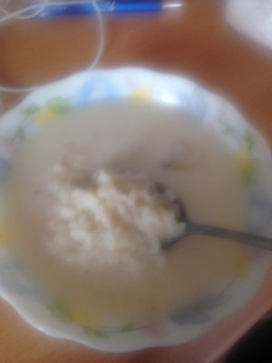 Mongolian Breakfast: Milk Soup, a piece of Fat, Rice, Salt
